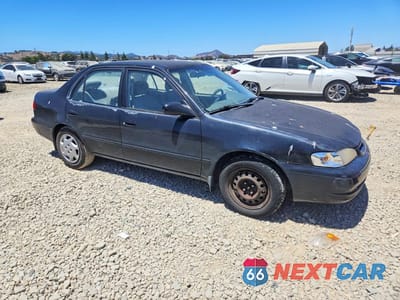 Czwarte zdjęcie samochodu z boku: 2000 TOYOTA COROLLA VE VIN:1NXBR12E4YZ393319 - miniatura