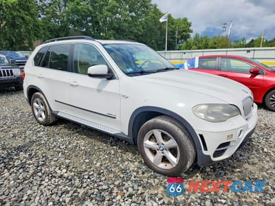 Czwarte zdjęcie samochodu z boku: 2012 BMW X5 XDRIVE50I VIN:5UXZV8C5XCL422566 - miniatura
