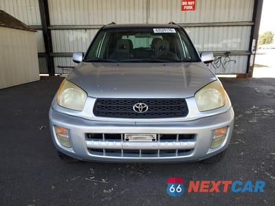 Piąte zdjęcie samochodu w środku: 2003 TOYOTA RAV4 BASE VIN:JTEGH20V130110232 - miniatura