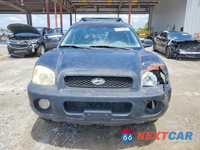 Piąte zdjęcie samochodu w środku: 2004 HYUNDAI SANTA FE GLS VIN:KM8SC13D84U745755 - miniatura
