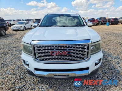 Piąte zdjęcie samochodu w środku: 2018 GMC CANYON DENALI VIN:1GTG6EEN8J1310911 - miniatura