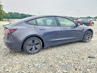 Trzecie zdjęcie samochodu z tyłu: 2021 TESLA MODEL 3 VIN:5YJ3E1EA0MF090019 - miniatura