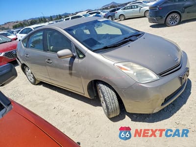 Czwarte zdjęcie samochodu z boku: 2004 TOYOTA PRIUS BASE VIN:JTDKB20U040030252 - miniatura