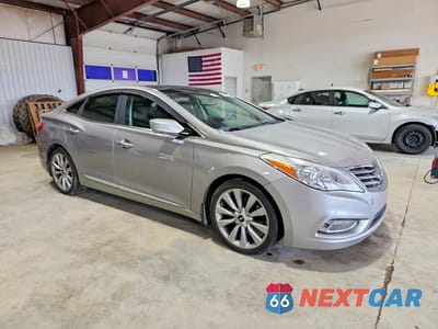 Czwarte zdjęcie samochodu z boku: 2013 HYUNDAI AZERA BASE VIN:KMHFH4JG6DA327651 - miniatura