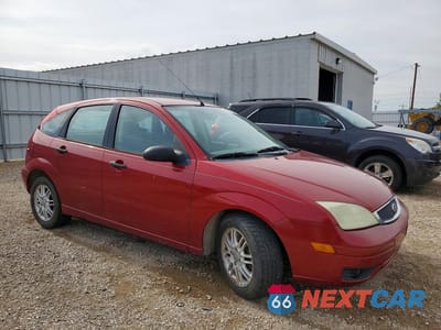 Czwarte zdjęcie samochodu z boku: 2005 FORD FOCUS ZX5 VIN:3FAFP37N35R148679 - miniatura
