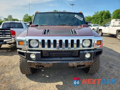 Piąte zdjęcie samochodu w środku: 2006 HUMMER H2 VIN:5GRGN23U66H100235 - miniatura