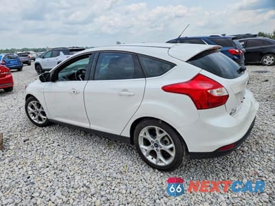 Drugie zdjęcie samochodu z przodu: 2014 FORD FOCUS TITANIUM VIN:1FADP3N27EL439510 - miniatura