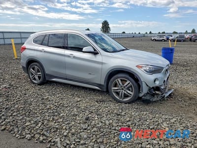 Czwarte zdjęcie samochodu z boku: 2018 BMW X1 XDRIVE28I VIN:WBXHT3C34J5K27636 - miniatura