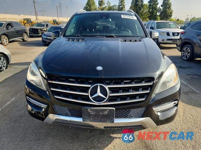 Piąte zdjęcie samochodu w środku: 2013 MERCEDES-BENZ ML 350 4MATIC VIN:4JGDA2EB1DA200496 - miniatura