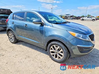 Czwarte zdjęcie samochodu z boku: 2014 KIA SPORTAGE LX VIN:KNDPB3AC0E7619635 - miniatura