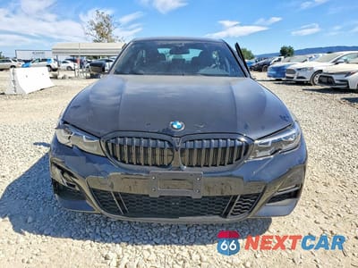 Piąte zdjęcie samochodu w środku: 2022 BMW 330I VIN:3MW5R1J09N8C41484 - miniatura