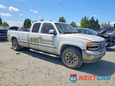 Czwarte zdjęcie samochodu z boku: 2000 GMC NEW SIERRA K1500 VIN:1GTEK19T3YE303873 - miniatura