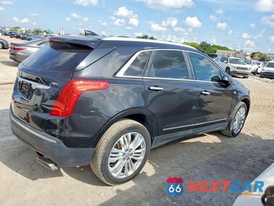 Trzecie zdjęcie samochodu z tyłu: 2017 CADILLAC XT5 PREMIUM LUXURY VIN:1GYKNCRS8HZ112031 - miniatura