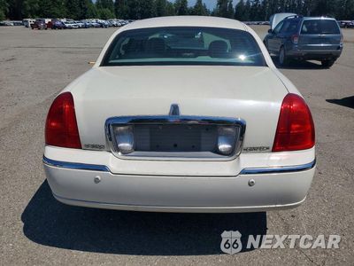 Zdjęcie 6 z 12 samochodu: 2004 LINCOLN TOWN CAR ULTIMATE VIN:1LNHM83W34Y625503 - miniatura