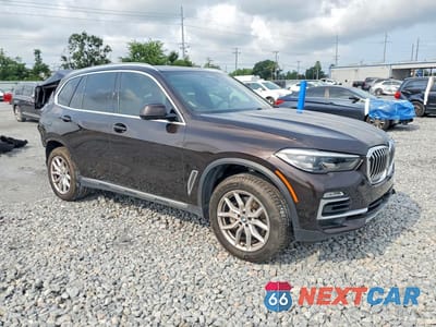 Czwarte zdjęcie samochodu z boku: 2021 BMW X5 XDRIVE40I VIN:5UXCR6C05M9F89227 - miniatura