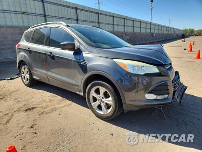 Czwarte zdjęcie samochodu z boku: 2016 FORD ESCAPE SE VIN:1FMCU9G96GUB98611 - miniatura