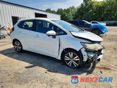 Czwarte zdjęcie samochodu z boku: 2016 HONDA FIT EX VIN:JHMGK5H77GX013951 - miniatura