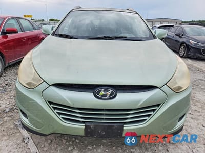 Piąte zdjęcie samochodu w środku: 2010 HYUNDAI TUCSON GLS VIN:KM8JU3AC9AU111896 - miniatura