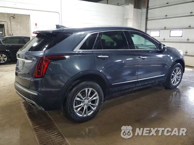 Trzecie zdjęcie samochodu z tyłu: 2021 CADILLAC XT5 PREMIUM LUXURY VIN:1GYKNCRS5MZ227261 - miniatura