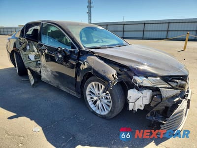 Czwarte zdjęcie samochodu z boku: 2019 TOYOTA CAMRY HYBRID XLE VIN:4T1B21HK0KU515229 - miniatura