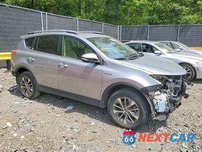 Czwarte zdjęcie samochodu z boku: 2018 TOYOTA RAV4 HYBRID XLE VIN:JTMRJREV4JD254124 - miniatura