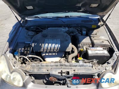 Zdjęcie 11 z 12 samochodu: 2002 HYUNDAI SONATA GL VIN:KMHWF25S12A570807 - miniatura