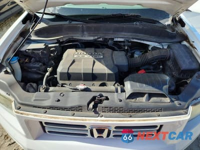 Zdjęcie 11 z 12 samochodu: 2007 HONDA RIDGELINE RTS VIN:2HJYK16427H529853 - miniatura