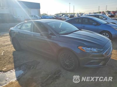 Czwarte zdjęcie samochodu z boku: 2017 FORD FUSION SE HYBRID VIN:3FA6P0LU7HR222847 - miniatura