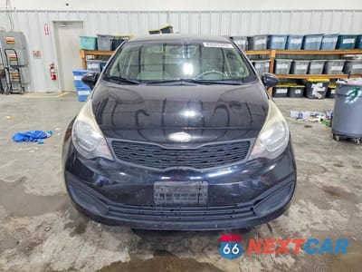 Piąte zdjęcie samochodu w środku: 2013 KIA RIO LX VIN:KNADM4A39D6241738 - miniatura