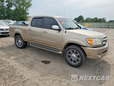 Czwarte zdjęcie samochodu z boku: 2004 TOYOTA TUNDRA DOUBLE CAB SR5 VIN:5TBDT44164S448404 - miniatura
