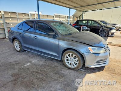 Czwarte zdjęcie samochodu z boku: 2015 VOLKSWAGEN JETTA SE VIN:3VWD17AJ7FM270926 - miniatura
