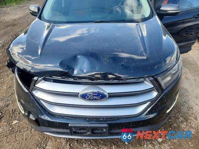 Zdjęcie 12 z 13 samochodu: 2018 FORD EDGE SEL VIN:2FMPK4J88JBC30966 - miniatura