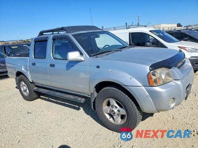 Czwarte zdjęcie samochodu z boku: 2001 NISSAN FRONTIER XE VIN:1N6ED27TX1C331347 - miniatura