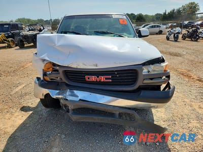 Piąte zdjęcie samochodu w środku: 1999 GMC NEW SIERRA C1500 VIN:1GTEC14V6XE548381 - miniatura
