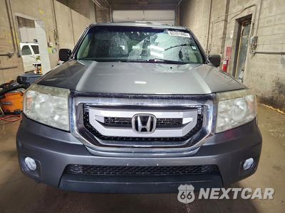 Piąte zdjęcie samochodu w środku: 2011 HONDA PILOT EXL VIN:5FNYF4H65BB007354 - miniatura