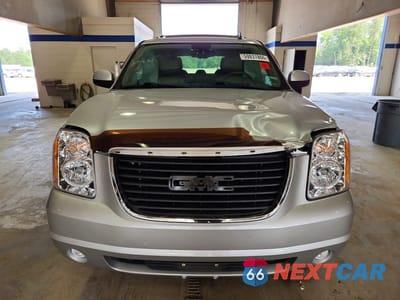 Piąte zdjęcie samochodu w środku: 2012 GMC YUKON SLT VIN:1GKS2CE04CR311500 - miniatura