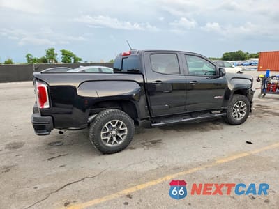 Trzecie zdjęcie samochodu z tyłu: 2022 GMC CANYON AT4 VIN:1GTG6FEN1N1327917 - miniatura