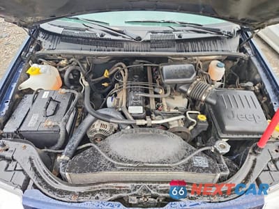 Zdjęcie 12 z 13 samochodu: 2004 JEEP GRAND CHEROKEE LAREDO VIN:1J4GW48S04C339351 - miniatura