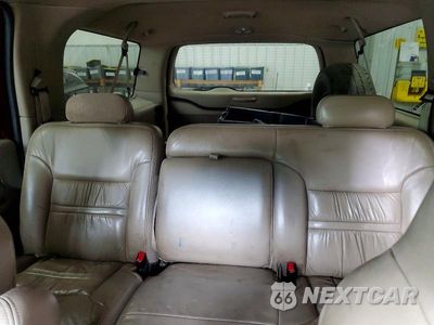 Zdjęcie 10 z 14 samochodu: 2001 FORD EXCURSION LIMITED VIN:1FMNU43S51EA71046 - miniatura