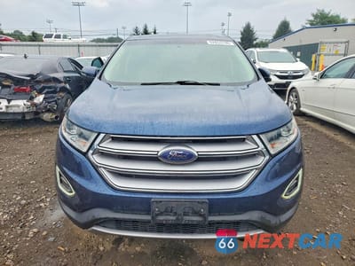 Piąte zdjęcie samochodu w środku: 2017 FORD EDGE TITANIUM VIN:2FMPK4K92HBB88151 - miniatura