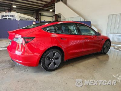 Trzecie zdjęcie samochodu z tyłu: 2022 TESLA MODEL 3 VIN:5YJ3E1EA7NF370361 - miniatura
