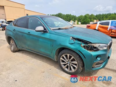 Czwarte zdjęcie samochodu z boku: 2018 BMW X6 SDRIVE35I VIN:5UXKU0C52J0G69717 - miniatura