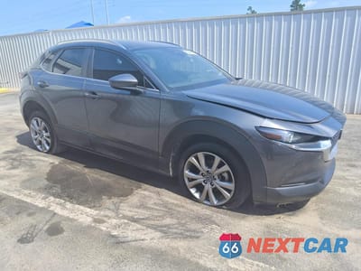 Czwarte zdjęcie samochodu z boku: 2022 MAZDA CX-30 SELECT VIN:3MVDMBBL4NM400445 - miniatura