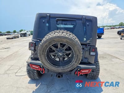 Zdjęcie 6 z 12 samochodu: 2014 JEEP WRANGLER UNLIMITED SAHARA VIN:1C4BJWEG5EL197848 - miniatura