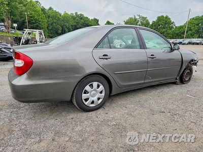 Trzecie zdjęcie samochodu z tyłu: 2002 TOYOTA CAMRY LE VIN:JTDBE32K920050344 - miniatura