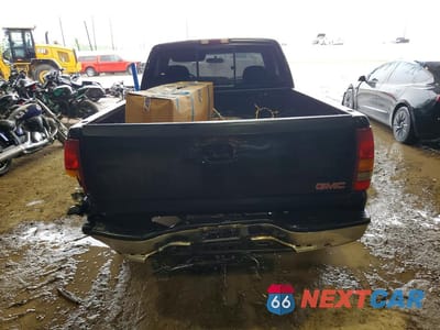 Zdjęcie 6 z 12 samochodu: 1999 GMC NEW SIERRA C1500 VIN:1GTEC14W1XZ510705 - miniatura