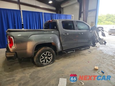 Trzecie zdjęcie samochodu z tyłu: 2019 GMC CANYON ALL TERRAIN VIN:1GTG6FENXK1150103 - miniatura