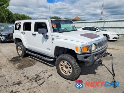 Czwarte zdjęcie samochodu z boku: 2006 HUMMER H3 VIN:5GTDN136468298631 - miniatura
