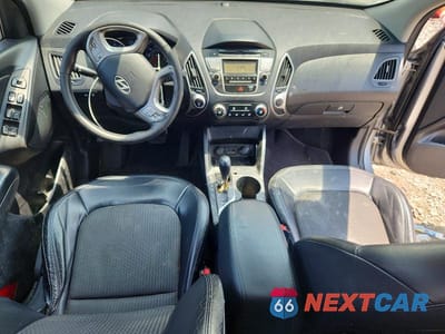 Zdjęcie 8 z 13 samochodu: 2010 HYUNDAI TUCSON GLS VIN:KM8JU3AC5AU091968 - miniatura