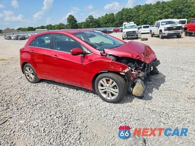 Czwarte zdjęcie samochodu z boku: 2014 HYUNDAI ELANTRA GT BASE VIN:KMHD35LHXEU177772 - miniatura